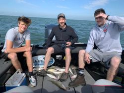 Three people fishing in Clarkston