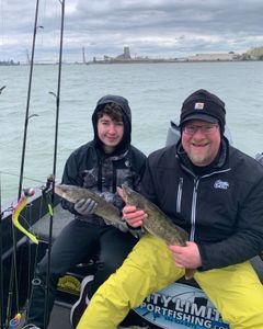 Two anglers fishing in MI