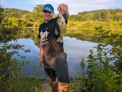 A person fishing for a crappie in PA