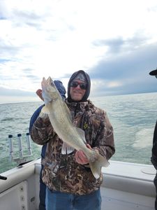 An angler holding a fishing rod in the state of Ohio