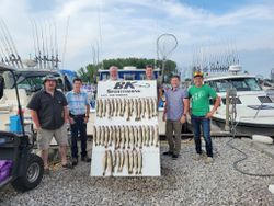 Group of 6 people enjoying a lakeside fishing trip in Lakeside Marblehead