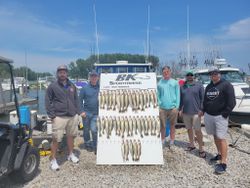 5 people fishing at lakeside in Marblehead