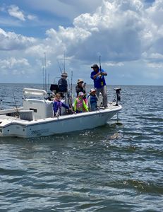 A group of 5 people fishing in Goodland