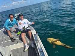 Two anglers enjoying a fishing trip in FL