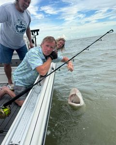 Three people enjoying a fishing trip in Goodland