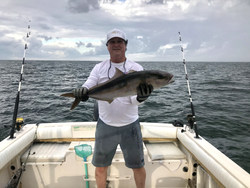 Angler holding a 22-inch catch in Florida