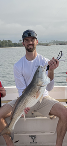 Angler holding a 25-inch fish in Pensacola