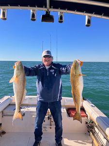 Two redfish, 30 inches long, caught while fishing in Pensacola