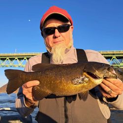 Angler with a fish at Harpers Ferry