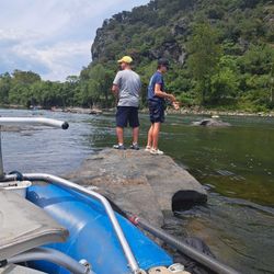Two people fishing on the river in WV