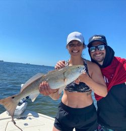 Catch of a 25-inch redfish in FL