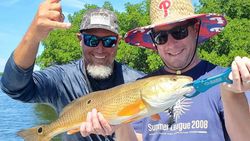 Two anglers with a big 21-inch fish in Placida
