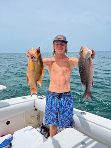 2 grey snapper fish caught fishing in FL