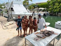 6 people fishing at Placida