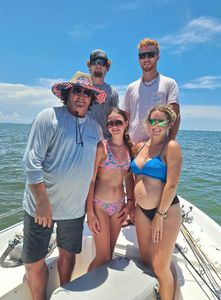 Group of five people enjoying fishing tours in Florida