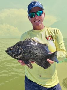 A fisherman enjoying a fishing tour in FL