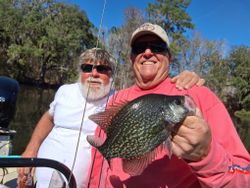 Two people enjoying a fishing tour in Citrus County