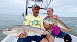 Two redfish caught during a fishing tour in FL