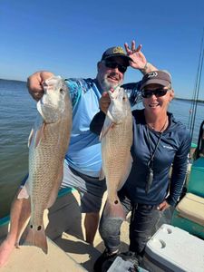 Two huge redfish caught during fishing tours in FL