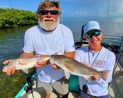 Two redfish, 14 inches long, caught in FL