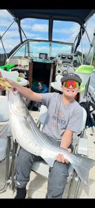 Two people on a fishing cruise in NY