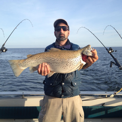 Angler catches a beautiful rainbow trout in Mexico