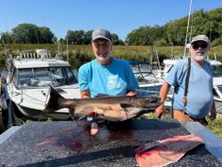 A photo of two people fishing for Coho Salmon in Mexico.