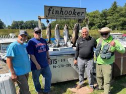 Four people fishing for Coho Salmon and Rainbow Trout in Mexico