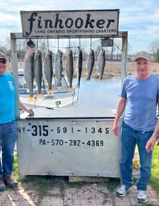 7 lake trout and coho salmon caught while fishing in NY