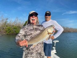 Two people fishing in St James City