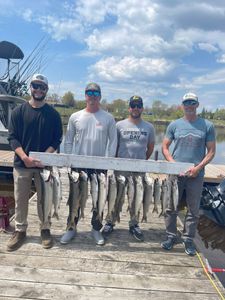 Four anglers fishing for lake trout in Superior