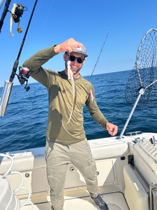 Nice catch using deep sea jigging techniques in partly cloudy conditions!