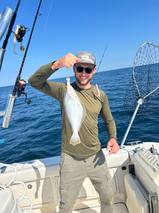 Nice summer flounder using deep sea jigging techniques in partly cloudy conditions!