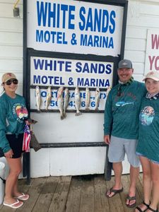 Three anglers fishing at South Padre Island