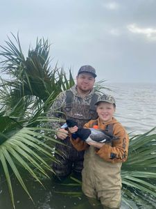 A photo of two people fishing in Carrabelle