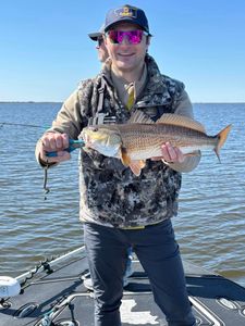 Sunshine, redfish, and laughter all day long.