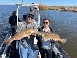 Proud smiles with the catch of the day!