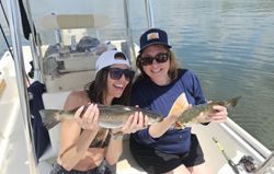 Two people fishing on the water in SC