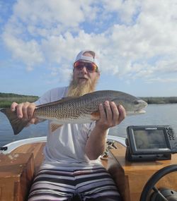 Angler with a redfish in South Carolina