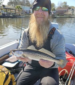 Angler fishing for spotted weakfish in Charleston
