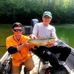 Anglers enjoying a fishing trip in Cotter