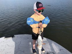 Kid enjoys fishing in Port Aransas TX