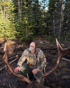 Avid angler holding fishing rod in Arizona landscape