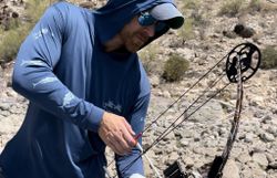 A person enjoying a day of fishing and hunting in Arizona