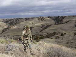 A person standing in Scottsdale, fishing and hunting