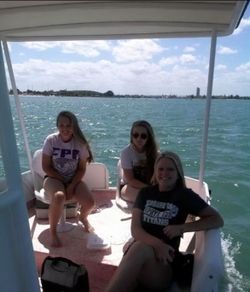 Three anglers enjoying a fishing trip in Fort Pierce