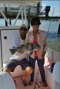 A couple enjoying a fishing trip in Florida