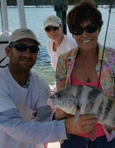 Three people fishing in Fort Pierce