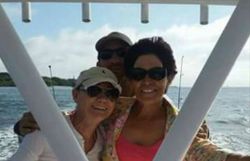 Three anglers enjoying a day of fishing at Fort Pierce