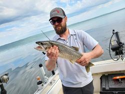 Angler with a brook trout caught in the Knife River